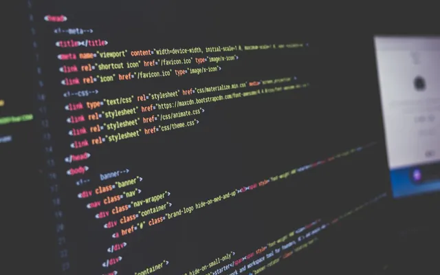 HTML and CSS code on a dark editor screen
